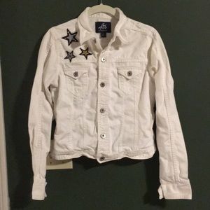 White jean jacket with star appliqué
